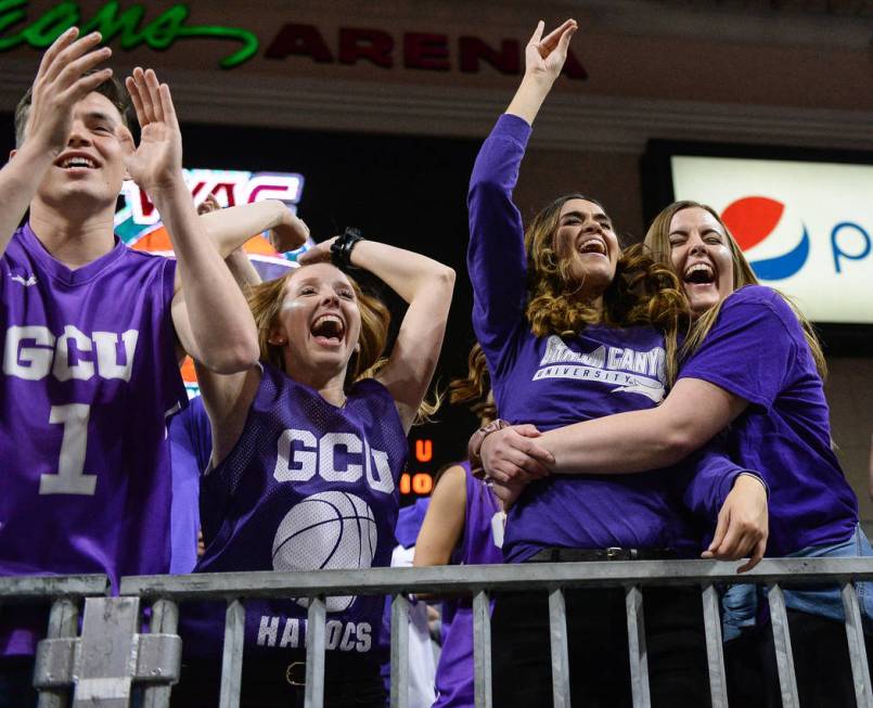 Fans in the Grand Canyon University student section cheer on their team in the second half of the opening round of the Western Athletic Conference tournament against Seattle University in Las Vega ...