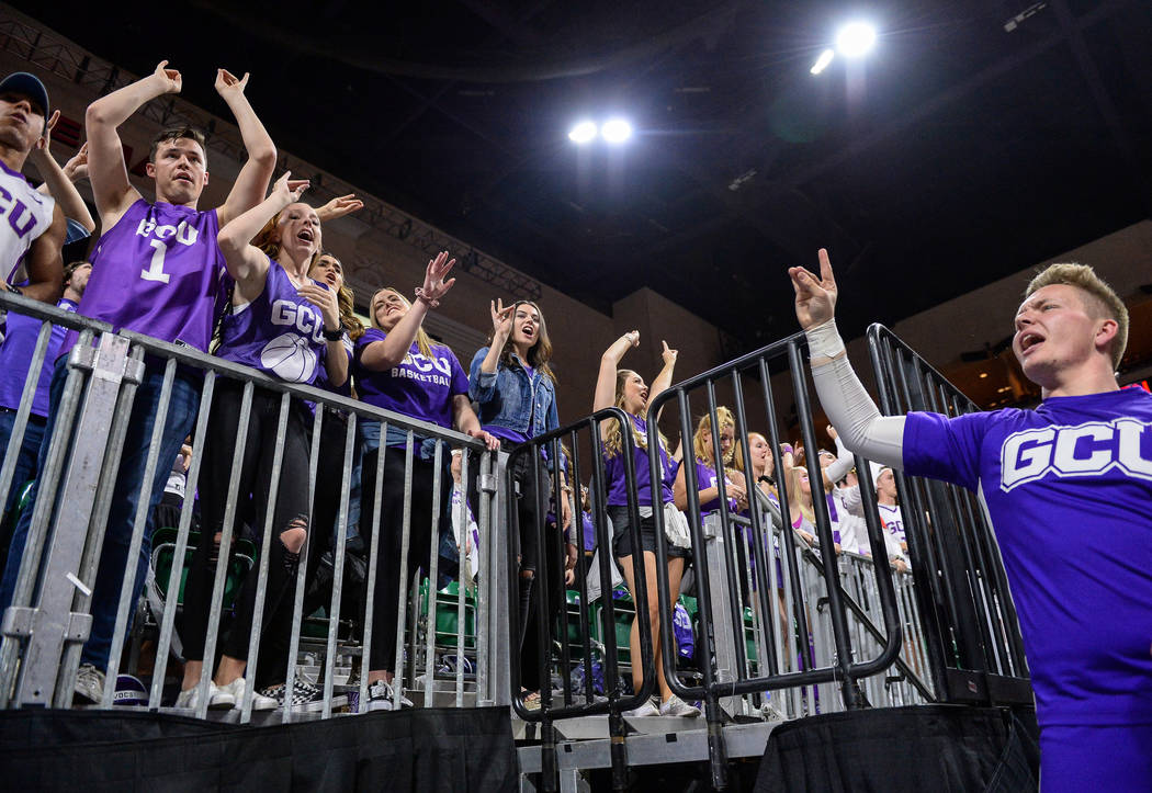 Fans in the Grand Canyon University student section cheer on their team in the second half of the opening round of the Western Athletic Conference tournament against Seattle University in Las Vega ...