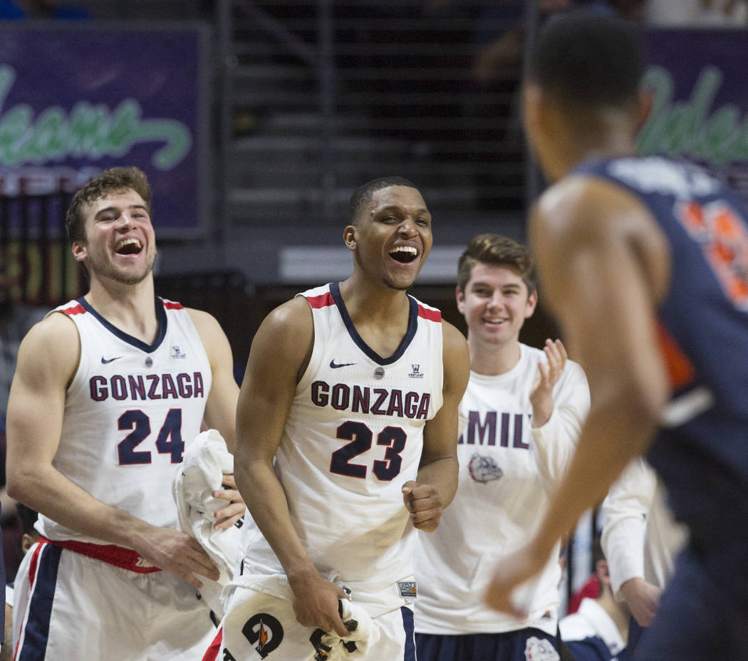 Gonzaga sophomore guard Zach Norvell Jr. (23) and sophomore forward Corey Kispert (24) cheer for their teammates in the second half during their West Coast Conference semifinal game with Pepperdin ...