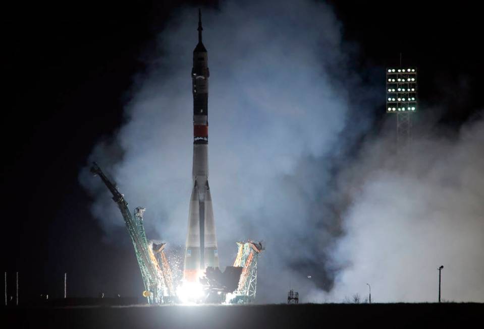 The Soyuz-FG rocket booster with Soyuz MS-12 space ship carrying a new crew to the International Space Station, ISS, blasts off at the Russian leased Baikonur cosmodrome, Kazakhstan, early Friday, ...