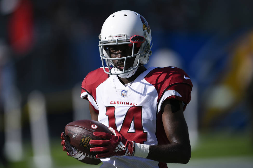 Former Arizona Cardinals wide receiver J.J. Nelson warms up before the start of an NFL football game against the Los Angeles Chargers Sunday, Nov. 25, 2018, in Carson, Calif. (AP Photo/Kelvin Kuo )