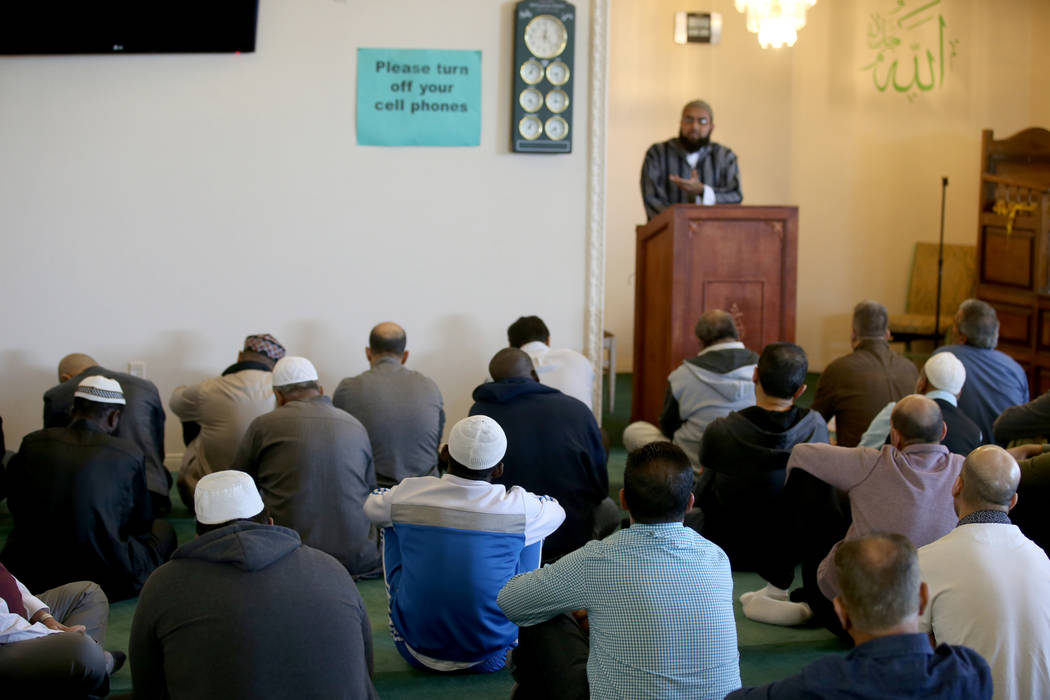 Worshipers listen to Shaykh Obair Katchi, Imam of Corona Masjid in California, during a prayer service at the Mosque of Islamic Society of Nevada in Las Vegas Friday, March 15, 2019. (K.M. Cannon/ ...