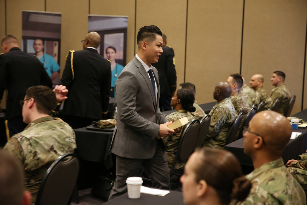 Anthony Hua after getting sworn in as captain for the U.S. Army Reserve during a ceremony at the Hampton Inn Tropicana and Event Center in Las Vegas, Friday, March 15, 2019. Hua is a general denti ...