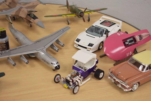 Automotive and aircraft models on display for IPMS members to look at during the "mingling" por ...