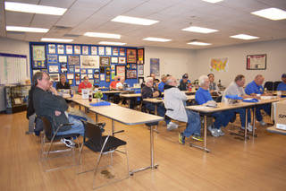 Members of the International Plastic Modelers Society Las Vegas chapter, listen to some of the ...