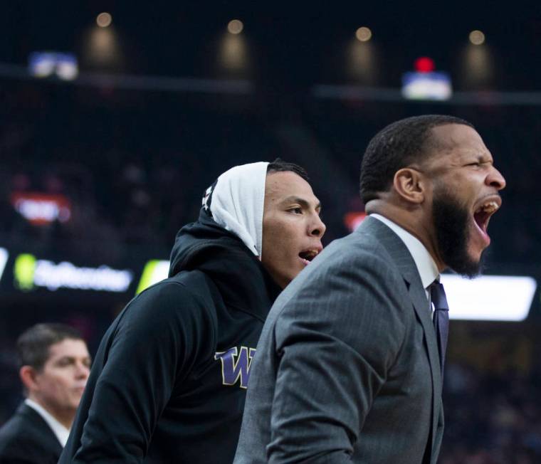 Washington's bench cheers on the Huskies during their Pac-12 semifinal game with Colorado on Friday, March 15, 2019, at T-Mobile Arena, in Las Vegas. (Benjamin Hager Review-Journal) @BenjaminHphoto