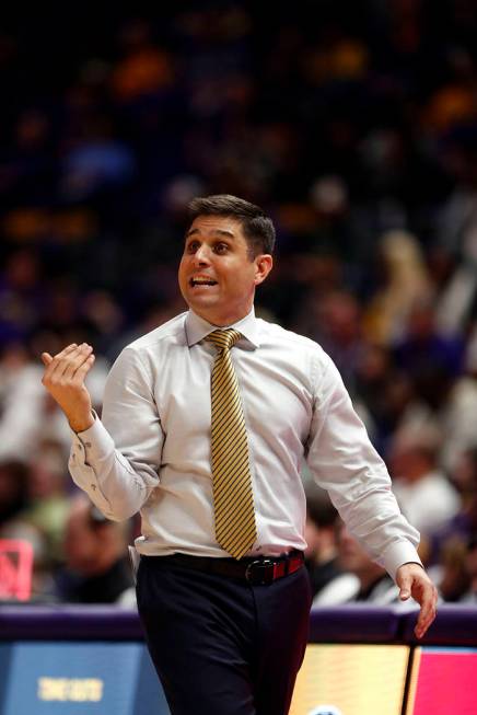 UNC Greensboro head coach Wes Miller calls out from the bench in the second half an NCAA college basketball game against LSU in Baton Rouge, La., Friday, Nov. 9, 2018. (AP Photo/Gerald Herbert)