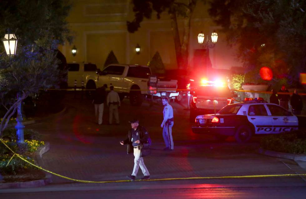 Las Vegas police officers investigate outside of the north valet at the Bellagio after police fired at a robbery suspect in Las Vegas on Friday, March 15, 2019. (Chase Stevens/Las Vegas Review-Jou ...