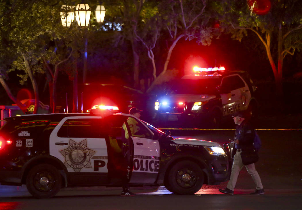 Las Vegas police officers investigate outside of the north valet at the Bellagio after police fired at a robbery suspect in Las Vegas on Friday, March 15, 2019. (Chase Stevens/Las Vegas Review-Jou ...