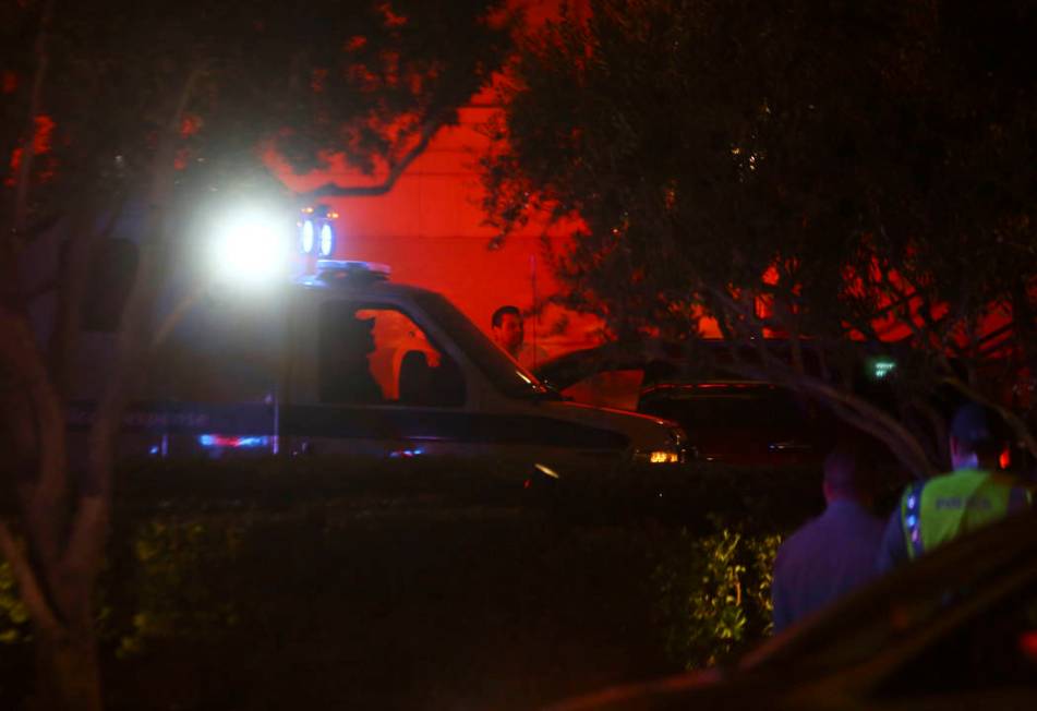 Las Vegas police officers investigate outside of the north valet at the Bellagio after police fired at a robbery suspect in Las Vegas on Friday, March 15, 2019. (Chase Stevens/Las Vegas Review-Jou ...