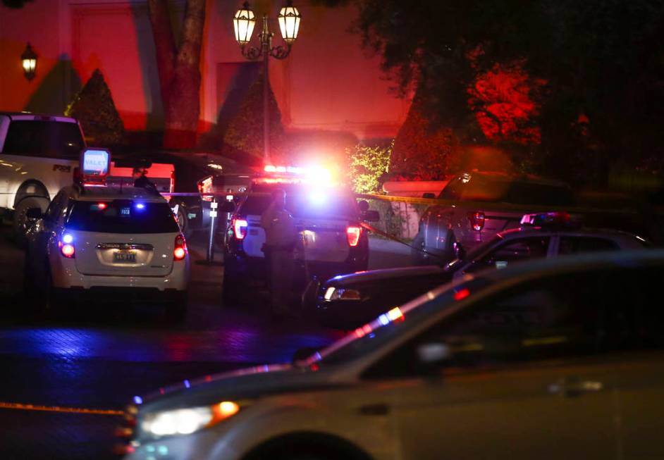 Las Vegas police officers investigate outside of the north valet at the Bellagio after police fired at a robbery suspect in Las Vegas on Friday, March 15, 2019. (Chase Stevens/Las Vegas Review-Jou ...