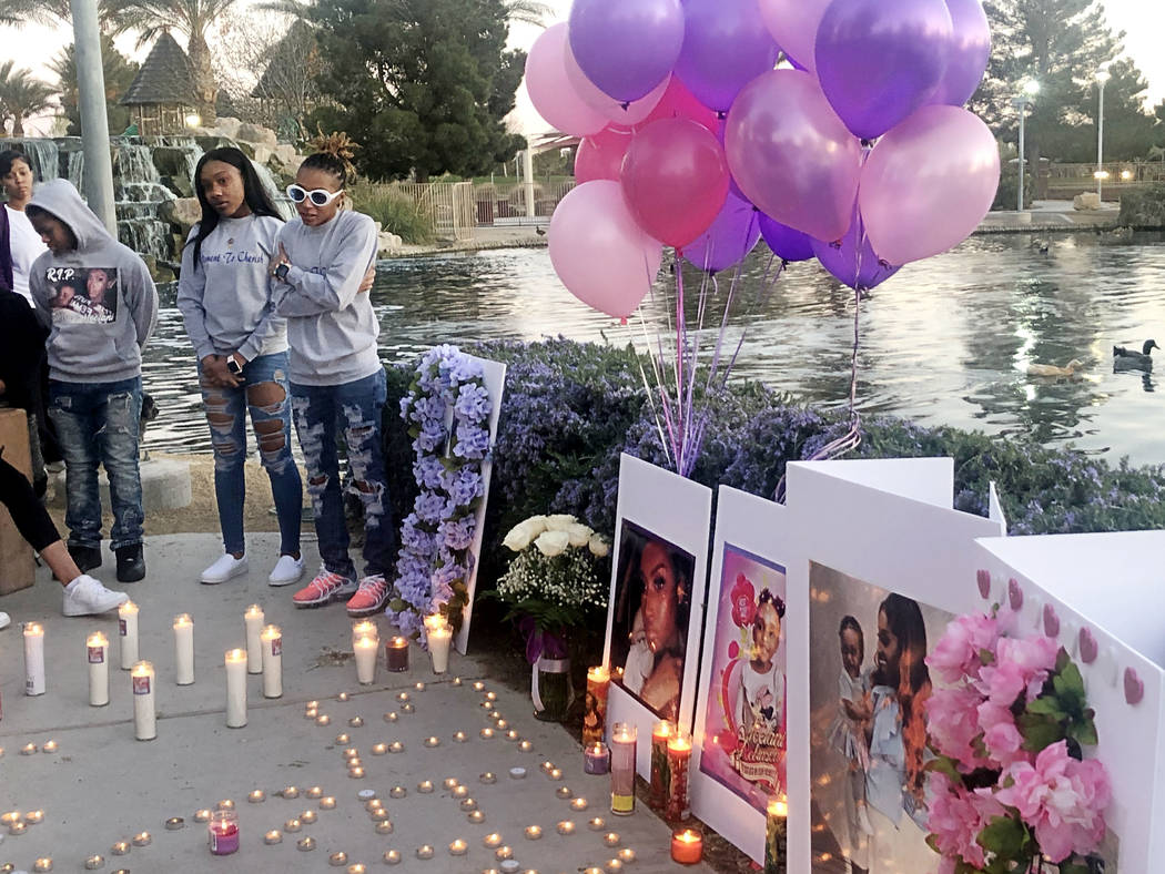 Pasha Weaver, 22, wearing white sunglasses, speaks during a vigil on Saturday, March 16, 2019, in North Las Vegas for her sister and 2-year-old niece: Sierra Robinson and Noelani Robinson. Police ...