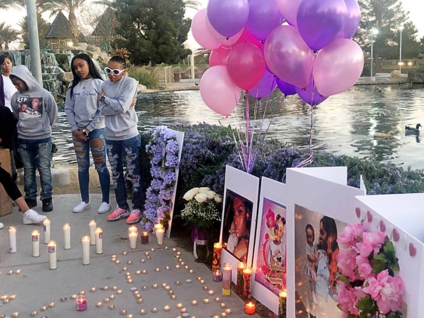 Pasha Weaver, 22, wearing white sunglasses, speaks during a vigil on Saturday, March 16, 2019, in North Las Vegas for her sister and 2-year-old niece: Sierra Robinson and Noelani Robinson. Police ...