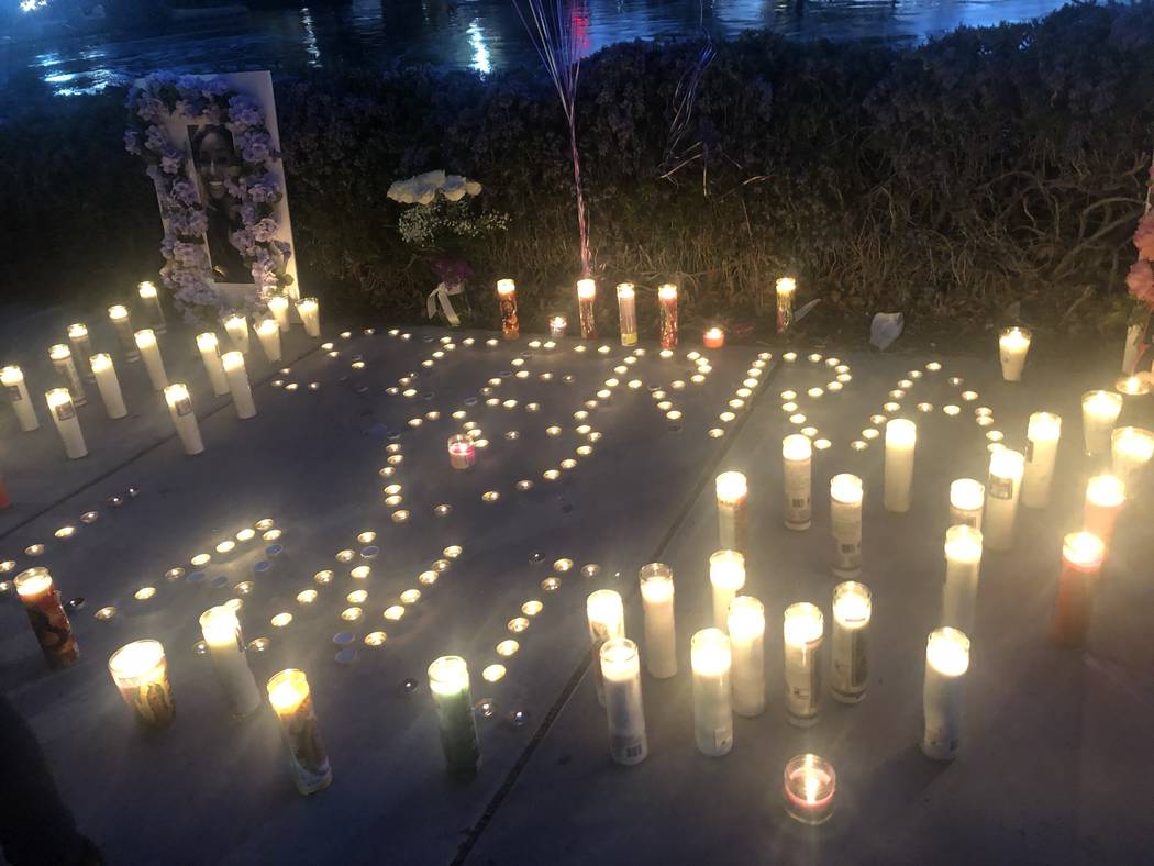 Candles spelled out "Sierra" and "Lani" during a vigil on Saturday, March 16, 2019, in North Las Vegas for Sierra Robinson, 24, and her daughter, 2-year-old Noelani Robinson. P ...