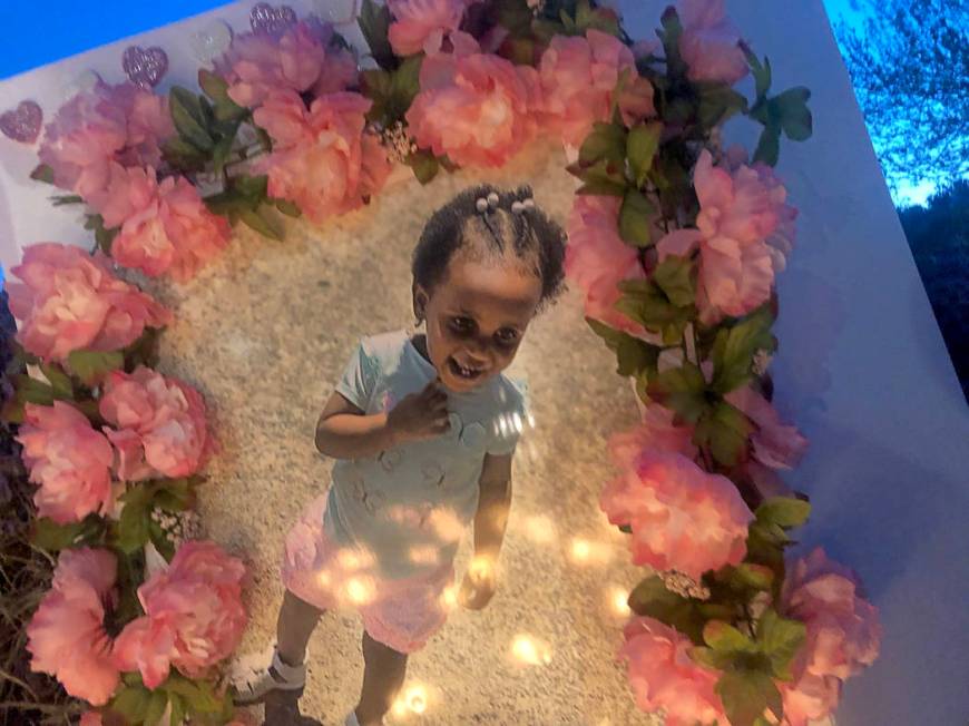 Candles illuminated a picture of 2-year-old Noelani Robinson during a vigil on Saturday, March 16, 2019, in North Las Vegas for the girl and her mother, Sierra Robinson, 24. Police said Sierra Rob ...