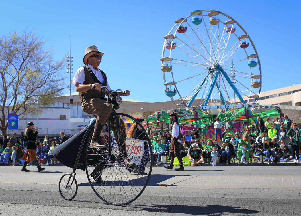 Joe Archer rides a Penny-farthing in the 53rd Annual Southern Nevada Sons & Daughters of Erin St. Patrick's Day parade in Henderson, Nev., on Saturday, March 16, 2019. Brett Le Blanc/Las Vegas ...