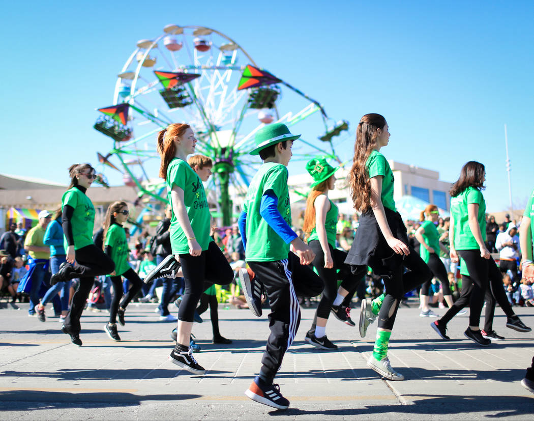 Dancers with the Scoil Rince Ni Riada Irish Dance school perform in the 53rd Annual Southern Nevada Sons & Daughters of Erin St. Patrick's Day parade in Henderson, Nev., on Saturday, March 16, ...