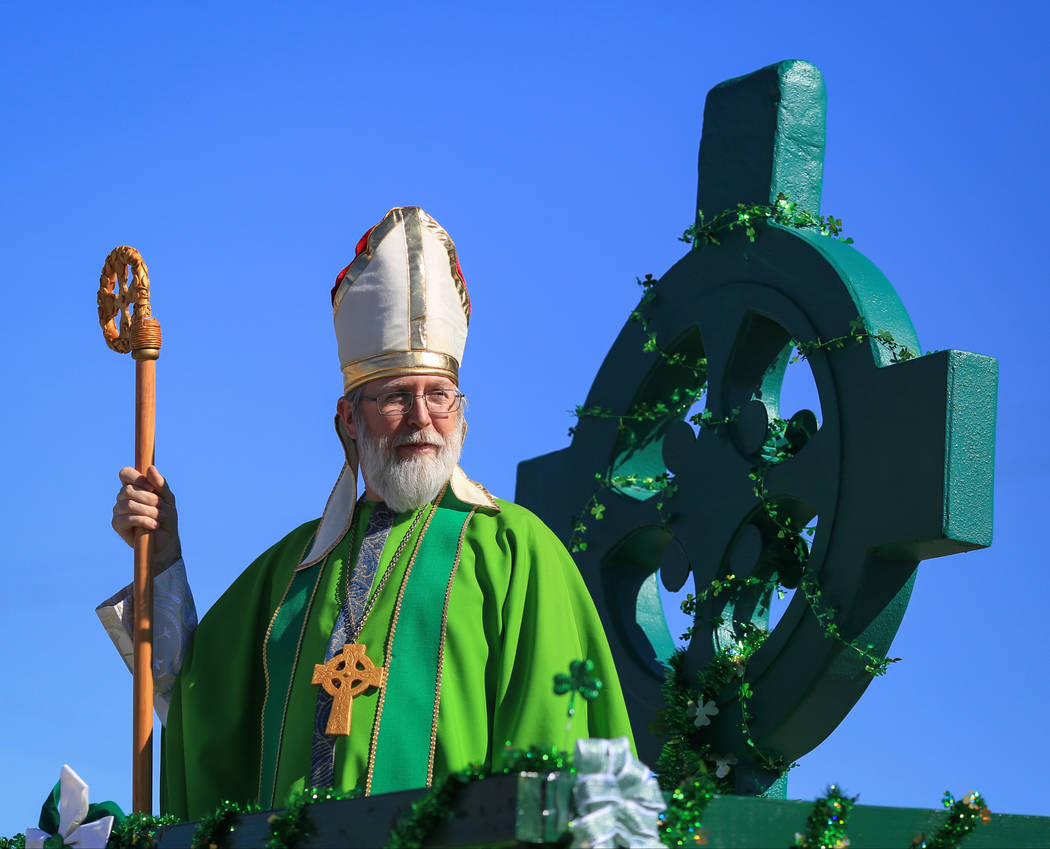 Scott Rice, with Southern Nevada Sons and Daughters of Erin, dresses as Saint Patrick to lead the the 53rd Annual Southern Nevada Sons & Daughters of Erin St. Patrick's Day parade in Henderson ...