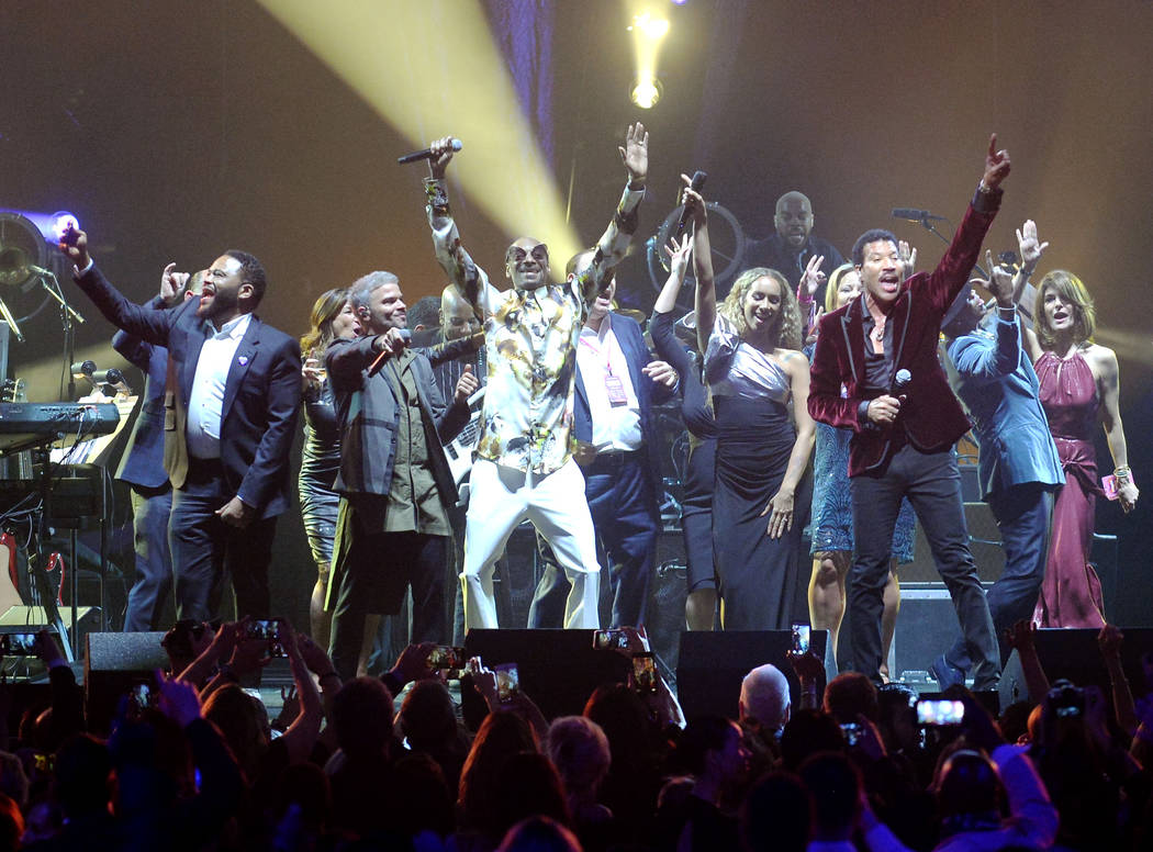 Anthony Anderson, left, Pedro Capo, Snoop Dogg, Leona Lewis and Lionel Richie perform with co-founder and chairman of Keep Memory Alive, Larry Ruvo, and co-founder and vice-chairman of Keep Memory ...