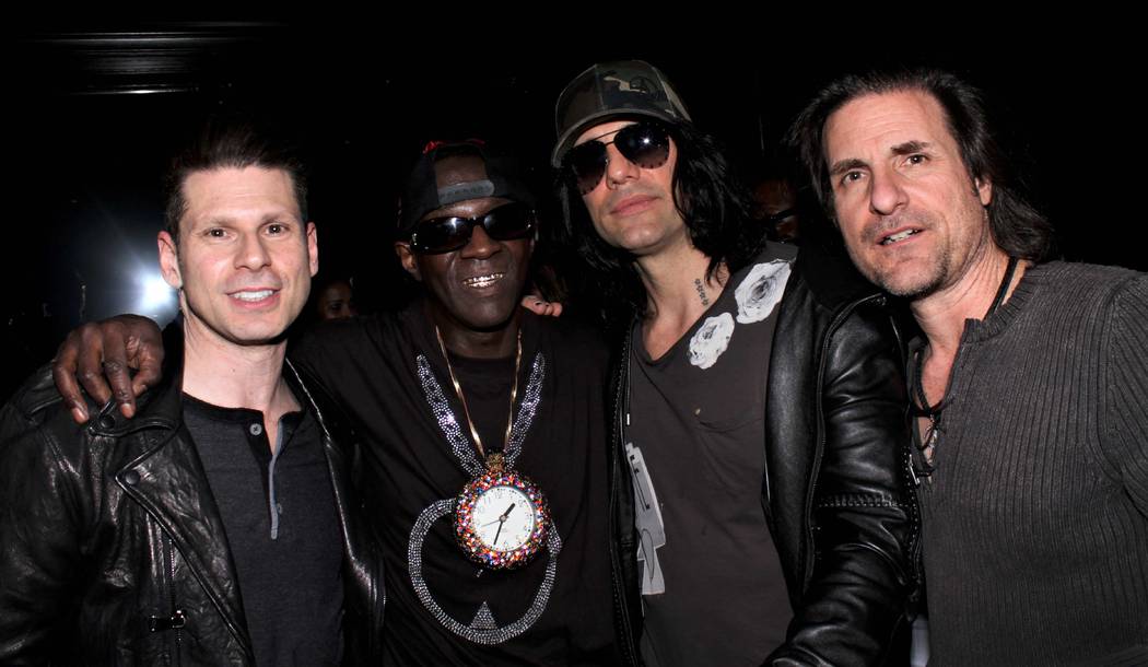 Mike Hammer, left, Flavor Flav Criss Angel and Angel's brother, JD Sarantakos, are shown at Flavor Flav's 60th birthday party at 172 music club on Saturday, March 16, 2019. (Ira Kuzma)