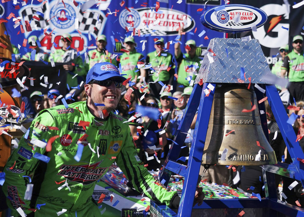 Kyle Busch celebrates after winning a NASCAR Cup Series auto race at Auto Club Speedway, in Fontana, Calif., Sunday, March 17, 2019. (AP Photo/Rachel Luna)