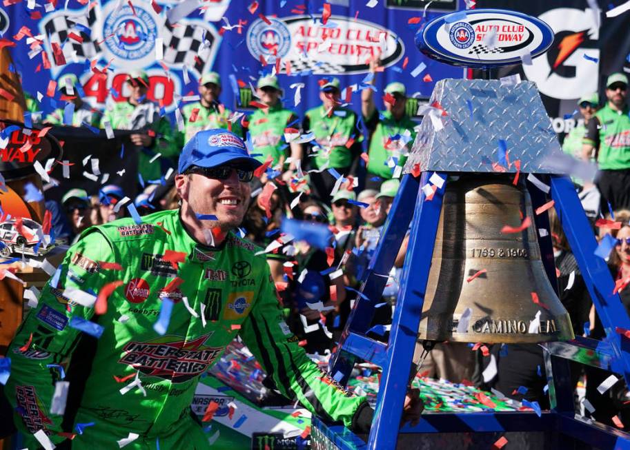 Kyle Busch celebrates after winning a NASCAR Cup Series auto race at Auto Club Speedway, in Fontana, Calif., Sunday, March 17, 2019. (AP Photo/Rachel Luna)