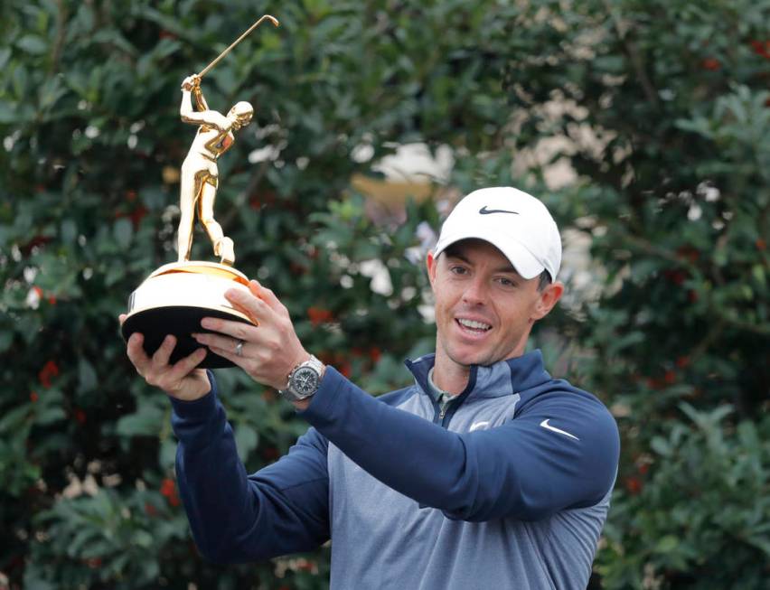 Rory McIlroy, of Northern Ireland, poses with the trophy after winning The Players Championship golf tournament Sunday, March 17, 2019, in Ponte Vedra Beach, Fla. (AP Photo/Gerald Herbert)