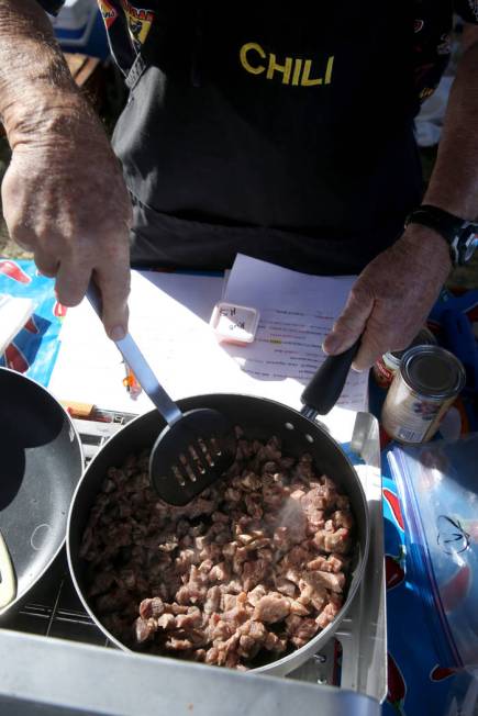 Clark McGee of Chino Hills, California, browns his chili meat in his booth at the Nevada State Chili Cook-off at Petrack Park in Pahrump Sunday, March 17, 2019. (K.M. Cannon/Las Vegas Review-Journ ...