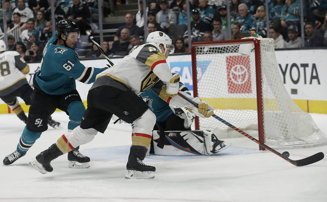 Vegas Golden Knights center Paul Stastny, center, shoots against San Jose Sharks defenseman Justin Braun (61) to score a goal during the second period of an NHL hockey game in San Jose, Calif., Mo ...