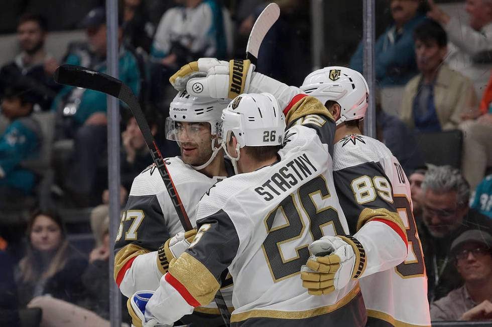 Vegas Golden Knights center Paul Stastny (26) is congratulated by teammates after scoring a goal against the San Jose Sharks during the second period of an NHL hockey game in San Jose, Calif., Mon ...