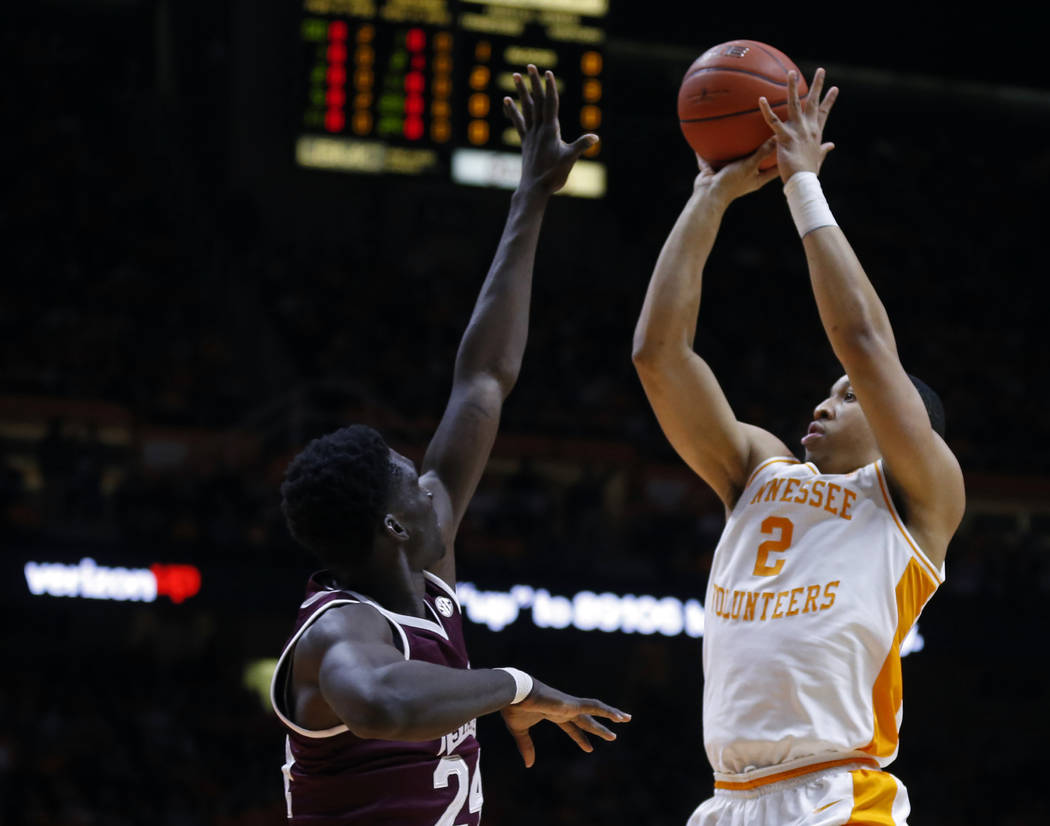 Tennessee forward Grant Williams (2) shoots over Mississippi State forward Abdul Ado (24) during the first half of an NCAA college basketball game Tuesday, March 5, 2019, in Knoxville, Tenn. (AP P ...