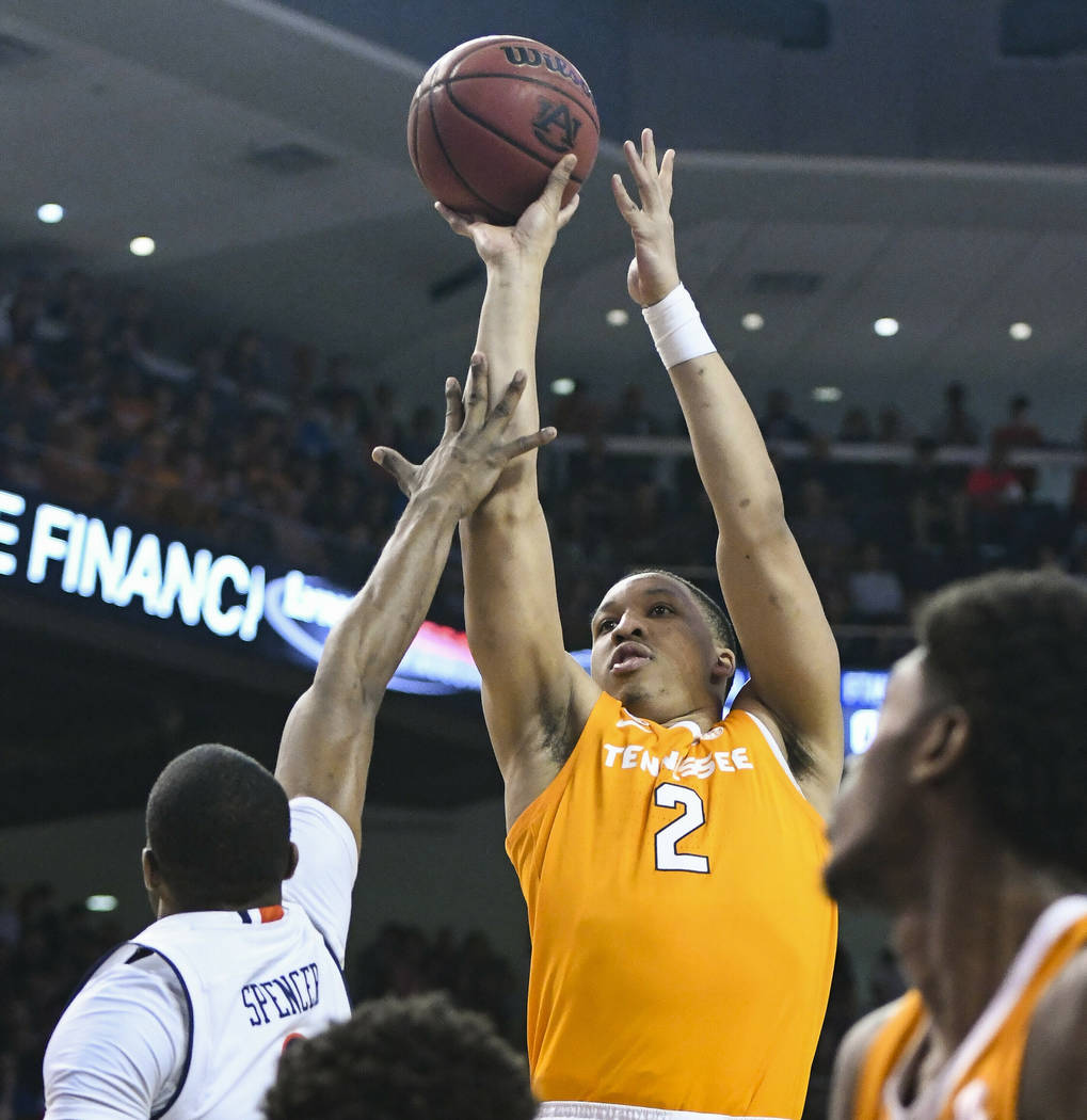 Auburn forward Horace Spencer (0) defends a shot by Tennessee forward Grant Williams (2) during the first half of an NCAA college basketball game Saturday, March 9, 2019, in Auburn, Ala. (AP Photo ...