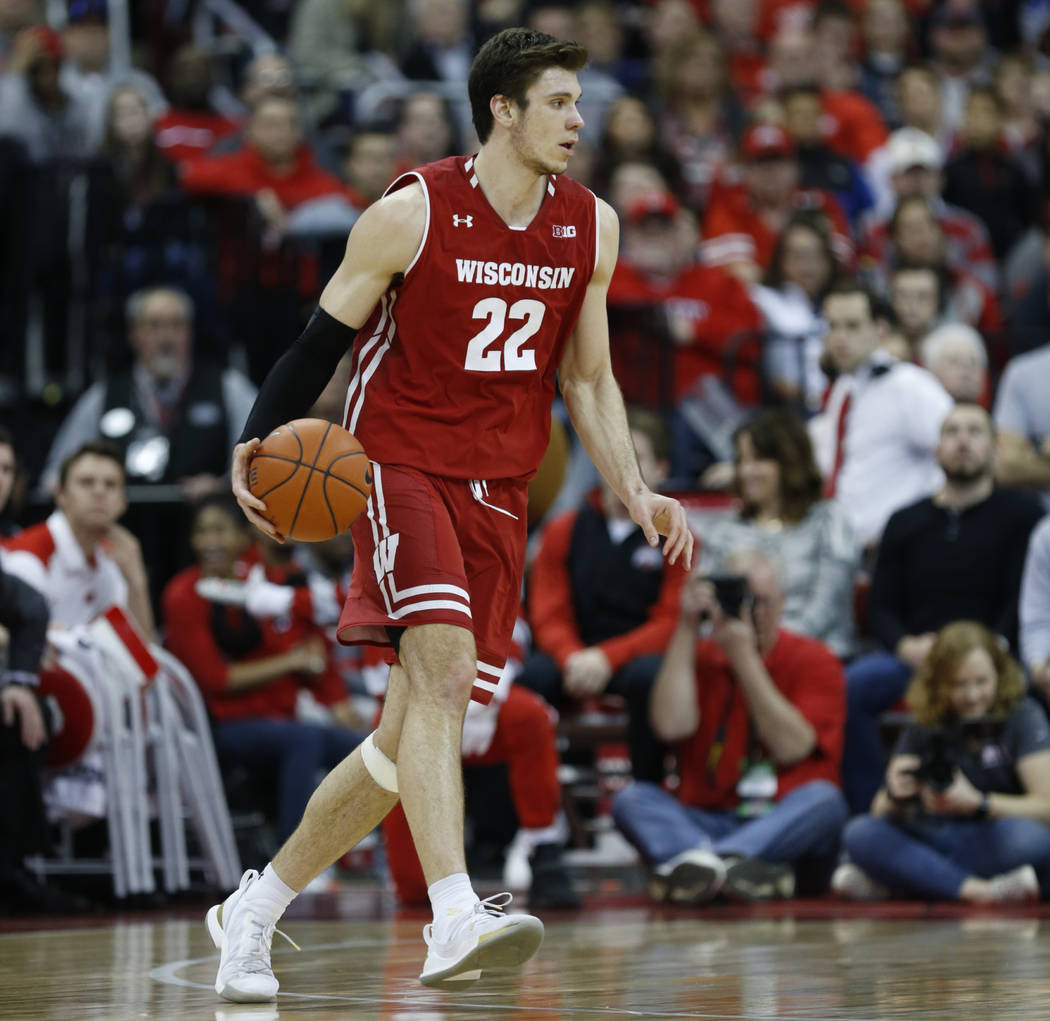 Wisconsin forward Ethan Happ drives against Ohio State during an NCAA college basketball game in Columbus, Ohio, Sunday, March 10, 2019. Wisconsin won 73-67 in overtime. (AP Photo/Paul Vernon)