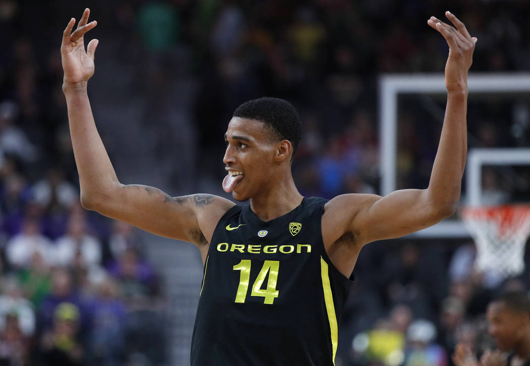 Oregon's Kenny Wooten celebrates during the second half of the team's NCAA college basketball game against Washington in the final of the Pac-12 men's tournament Saturday, March 16, 2019, in Las V ...