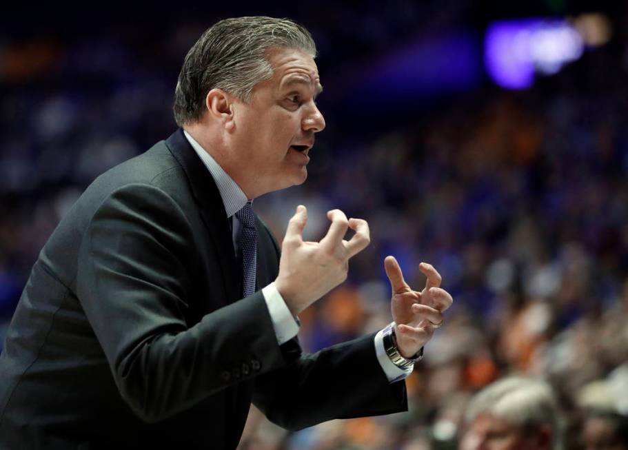 Kentucky head coach John Calipari yells to his players in the first half of an NCAA college basketball game against Tennessee at the Southeastern Conference tournament Saturday, March 16, 2019, in ...