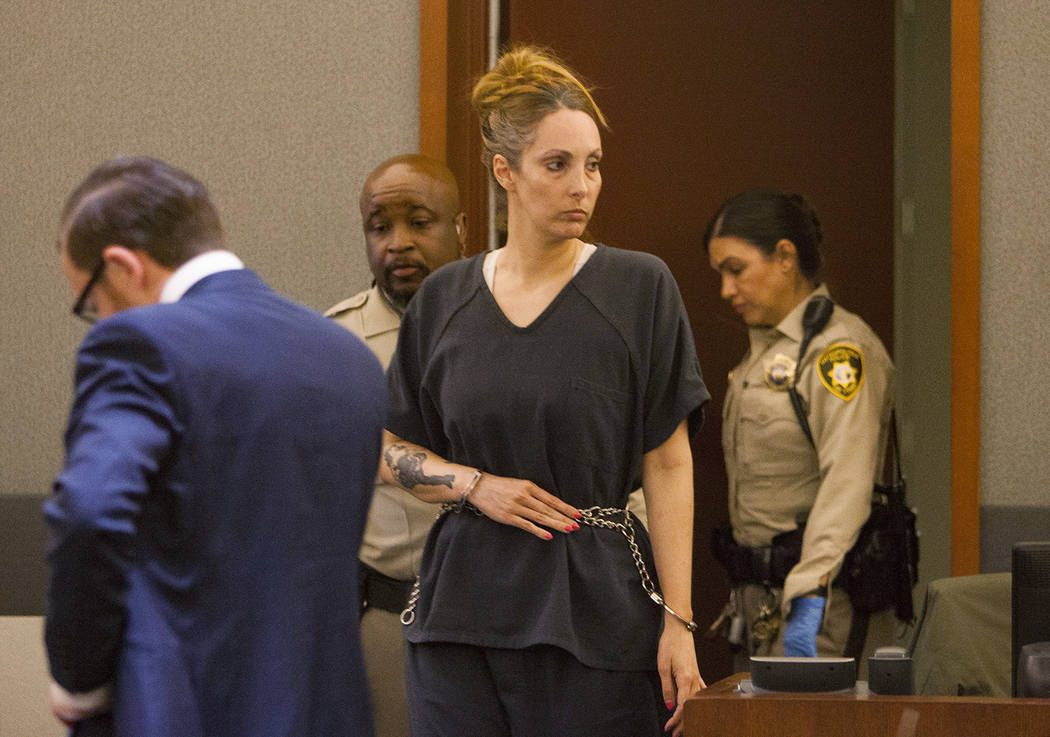 Attorney Alexis Plunkett enters the courtroom at the Regional Justice Center in Las Vegas on Tuesday, March 19, 2019. She pleaded guilty to allowing clients to use cellphones in jail. (Rachel Asto ...