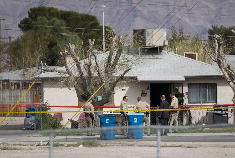 Metro works the scene of an officer-involved shooting in the 500 block of N. 9th Street on Tuesday, March 19, 2019, in Las Vegas. (Benjamin Hager Review-Journal) @BenjaminHphoto