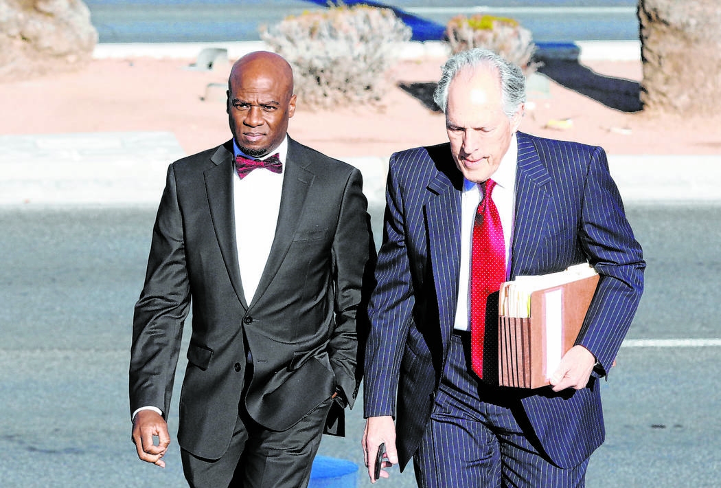 Former Nevada Senate majority leader Kelvin Atkinson, left, and his attorney Richard Wright arrive at the Lloyd George U.S. Courthouse on Monday, March. 11, 2019, in Las Vegas. Bizuayehu Tesfaye L ...