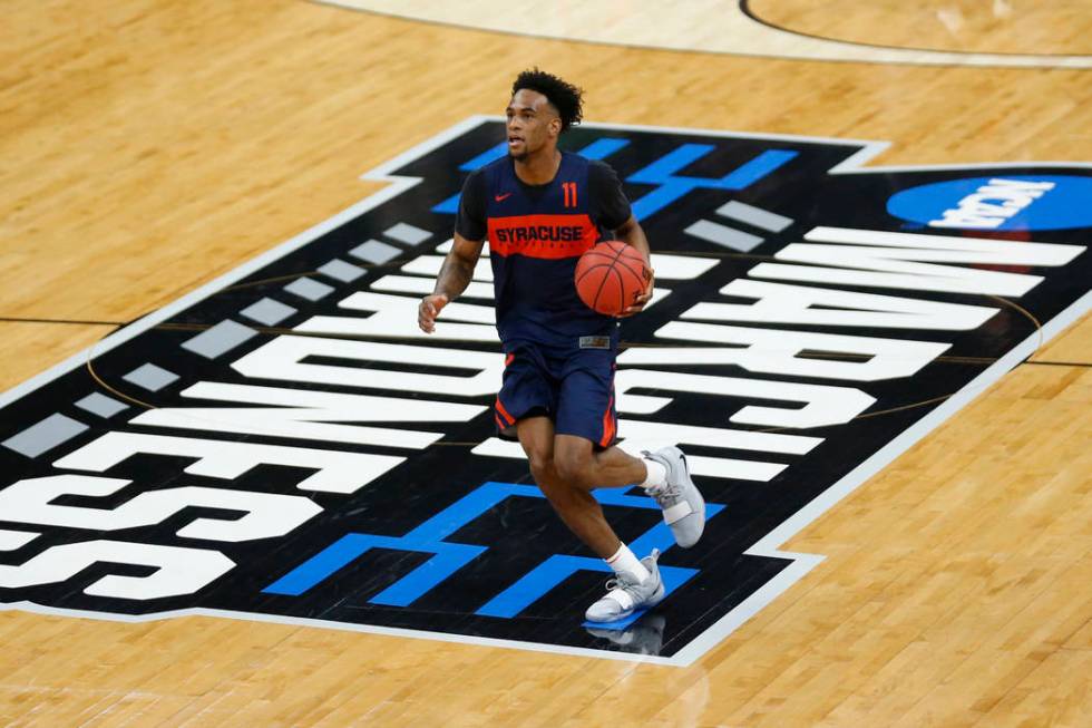 Syracuse's Oshae Brissett brings the ball up court during practice at the NCAA men's college basketball tournament Wednesday, March 20, 2019, in Salt Lake City. (AP Photo/Rick Bowmer)