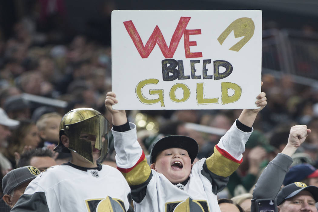 Golden Knights fans celebrate after Vegas scored a goal in the first period during their home matchup with the Minnesota Wild on Monday, Jan. 21, 2019, at T-Mobile Arena, in Las Vegas. (Benjamin H ...