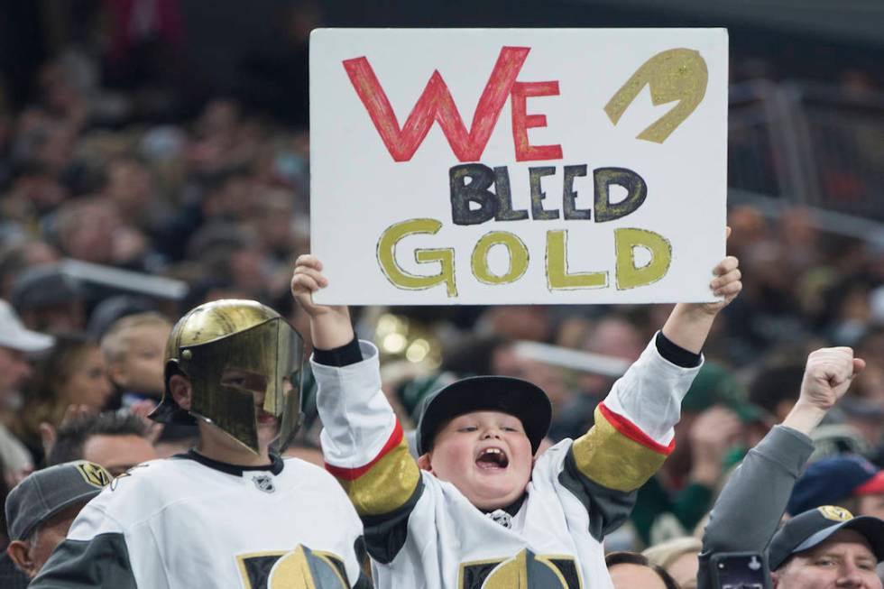 Golden Knights fans celebrate after Vegas scored a goal in the first period during their home matchup with the Minnesota Wild on Monday, Jan. 21, 2019, at T-Mobile Arena, in Las Vegas. (Benjamin H ...