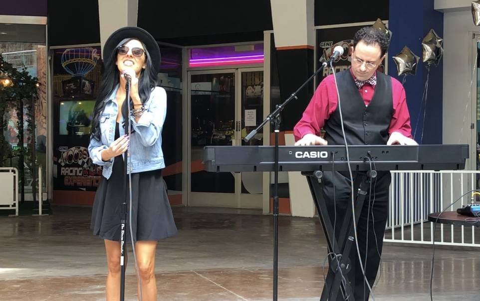 Gloria Vivelo and Kenny Davidsen are shown at the ribbon-cutting ceremony for Don't Tell Mama on Wednesday, March 20, 2019. (John Katsilometes/Las Vegas Review-Journal) @JohnnyKats