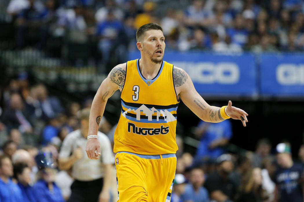 Denver Nuggets guard Mike Miller talks to an official was he jogs up court during an NBA basketball game against the Dallas Mavericks in Dallas, Tuesday, April 11, 2017. (AP Photo/Tony Gutierrez)