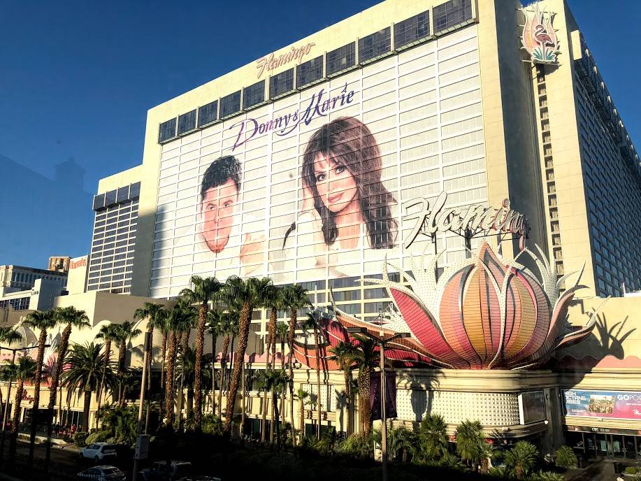 The faces of Donny and Marie Osmond adorn the side of the Flamingo Las Vegas on the Las Vegas Strip, site of their long-running show.