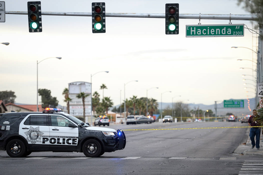 The Metropolitan Police Department investigates an apparent murder-suicide in the 5400 block of Eastern Avenue in Henderson, Wednesday, March 20, 2019. (Caroline Brehman/Las Vegas Review-Journal) ...