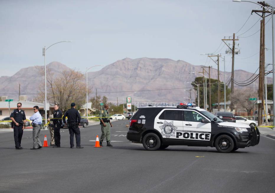 Metro works the scene of an officer-involved shooting in the 500 block of N. 9th Street on Tuesday, March 19, 2019, in Las Vegas. (Benjamin Hager Review-Journal) @BenjaminHphoto