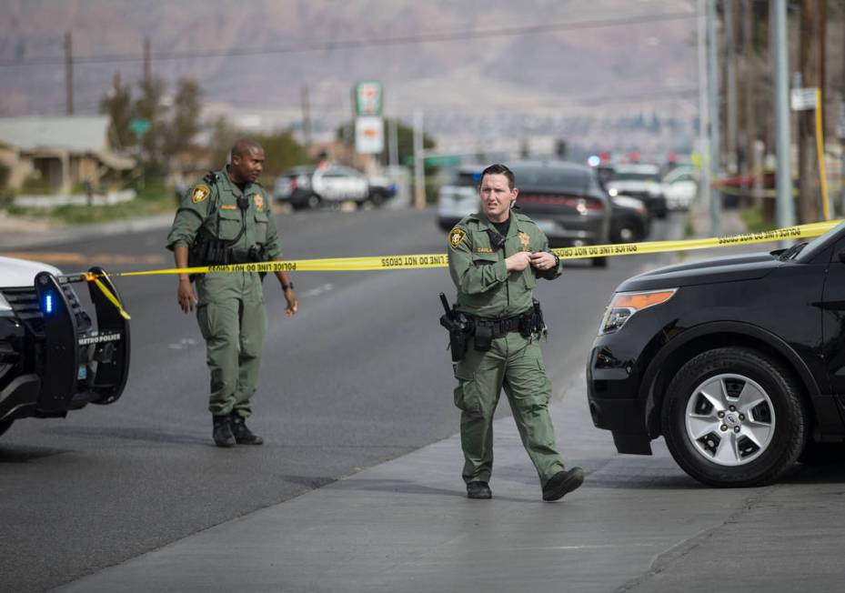 Metro works the scene of an officer-involved shooting in the 500 block of N. 9th Street on Tuesday, March 19, 2019, in Las Vegas. (Benjamin Hager Review-Journal) @BenjaminHphoto