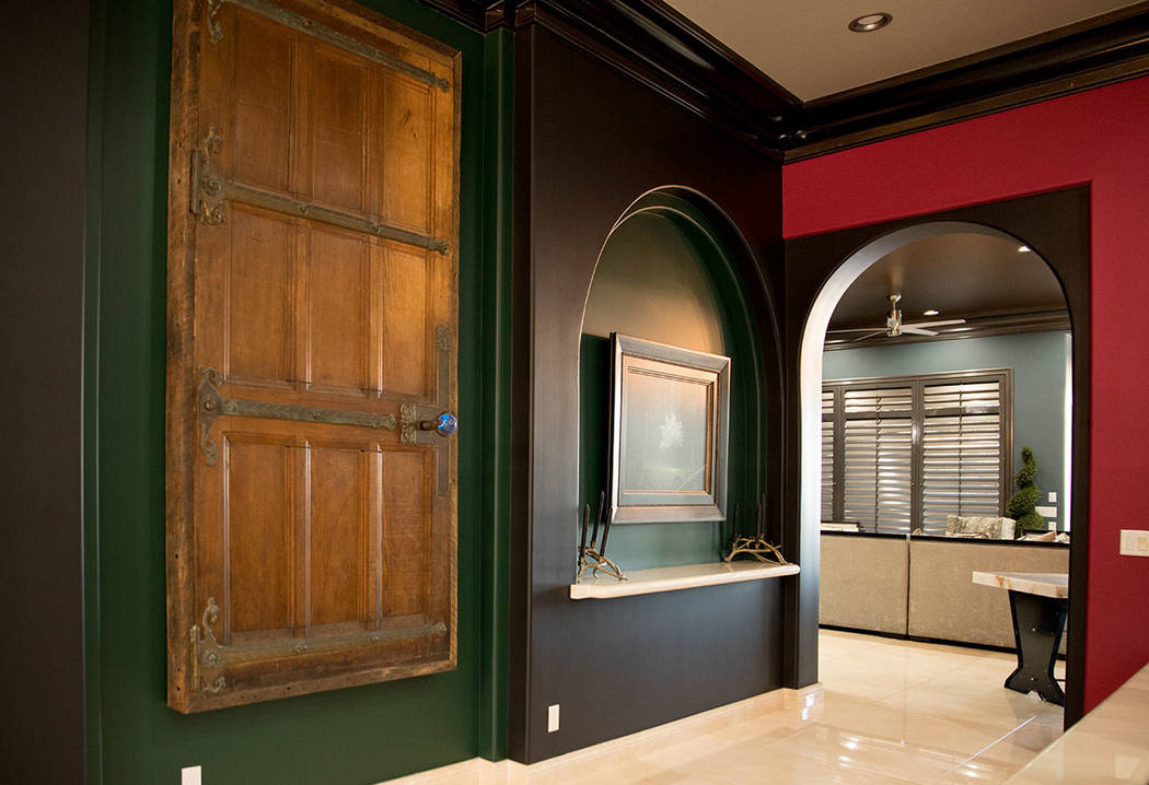 A 200-year-old door hangs on the wall. (Tonya Harvey Real Estate Millions)