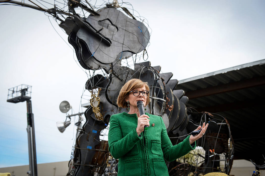 Rep. Susie Lee, D-Nev., and founder of Girl Scout troop 41, speaks at a viewing of local Girl Scout Tahoe Mack's Monumental Mammoth structure at XL Steel in Las Vegas, Thursday, March 21, 2019. (C ...