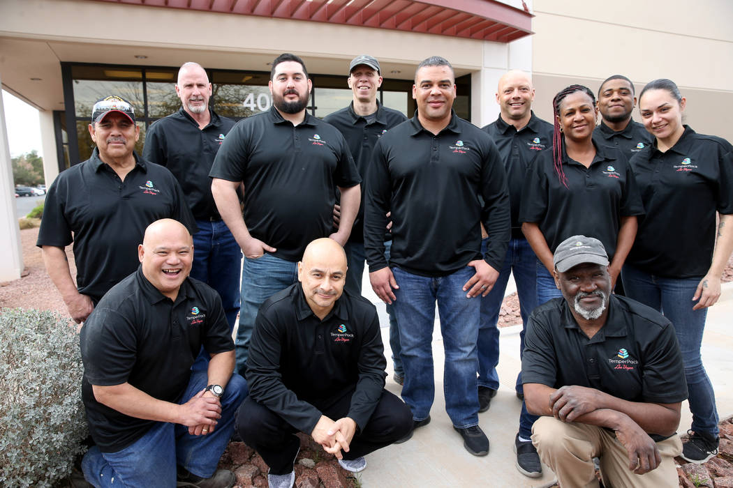 The TemperPack team at their Las Vegas office Wednesday, March 20, 2019. Kneeling from left are Ron Batula, safety manager, Victor Pineda, production manager, and Bill Ellick, facilities maintenan ...
